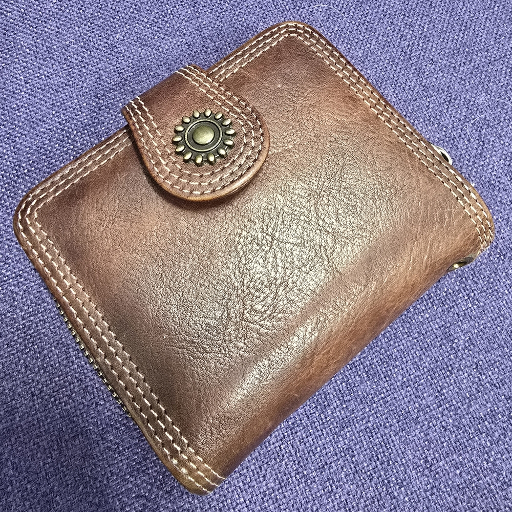 Stylish Brown Leather Wallet with Decorative Button